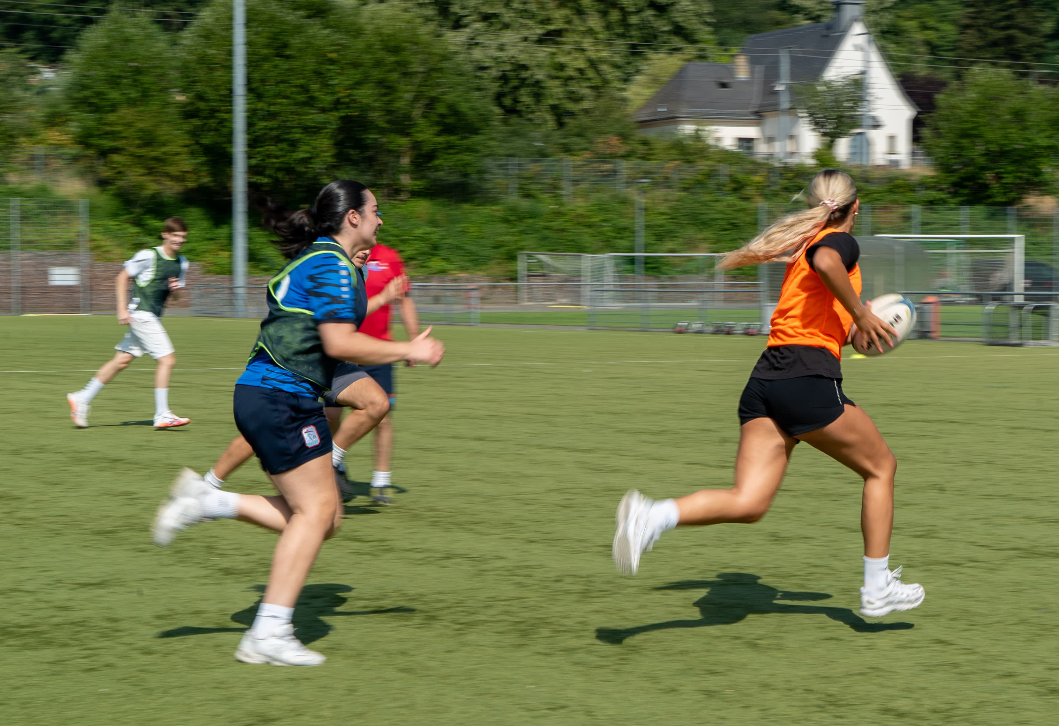 From First Pass to Full Match: Learning to Coach Through Touch Rugby
